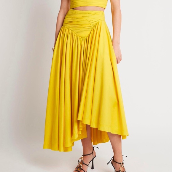 AJE WOMEN'S JOLIE ASYMMETRIC COTTON MIDI SKIRT IN YELLOW - Picture 1 of 5